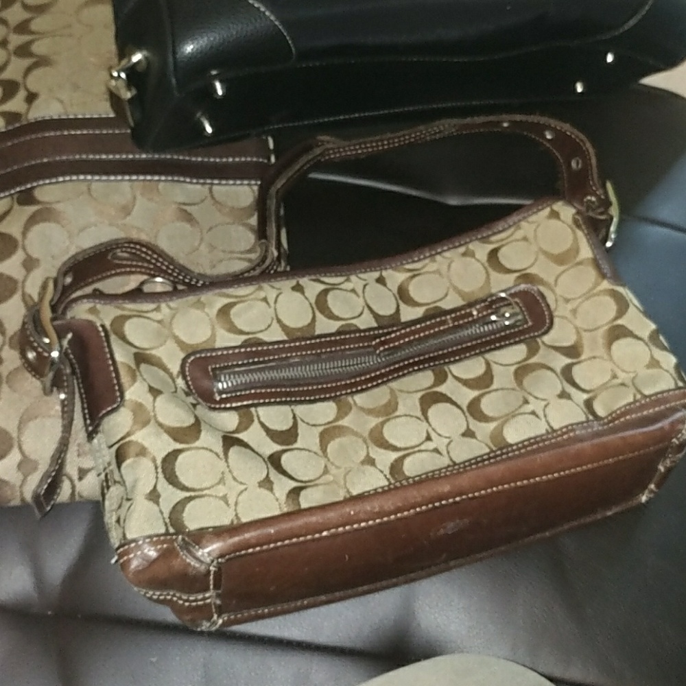 Couch and Prada bags